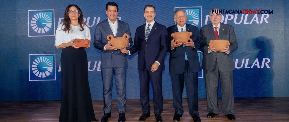 rewrite this title Banco Popular promotes Dominican culture at its gala dinner at FITUR and reaffirms support for national tourism