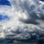 Forecast predicts partly cloudy skies and possible showers in Veron–Punta Cana throughout the day according to INDOMET